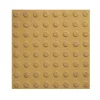 Baldosa Minvu Táctil 0 Amarillo Arroz 40×40 cm con botones en relieve para señalizar alerta, detención y precaución en rutas accesibles.