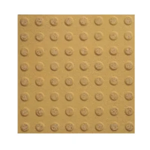 Baldosa Minvu Táctil 0 Amarillo Arroz 40×40 cm con botones en relieve para señalizar alerta, detención y precaución en rutas accesibles.