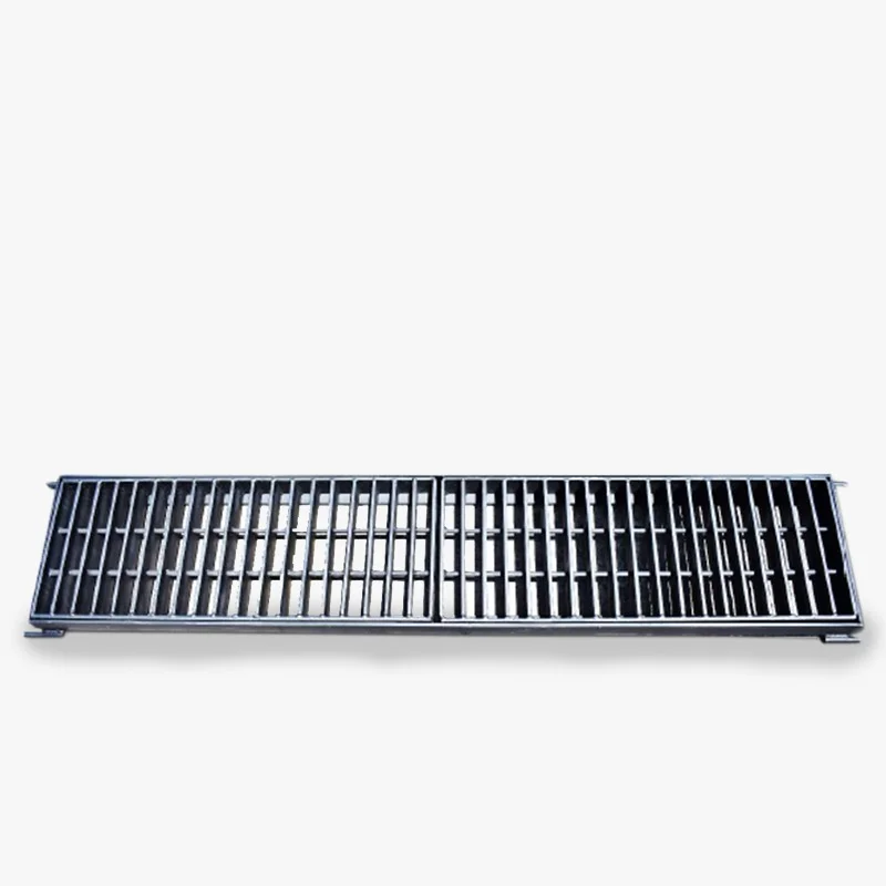 Rejilla Tipo SERVIU de acero laminado de Australmat para drenaje vial, disponible en distintas medidas, marcos y terminaciones anticorrosivas o galvanizadas.